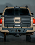 A locking durable tacoma tailgate pad that has room for the tailgate latch and backup camera 