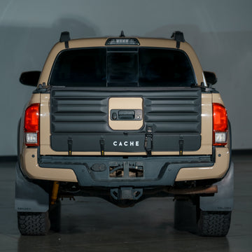 A locking durable tacoma tailgate pad that has room for the tailgate latch and backup camera 