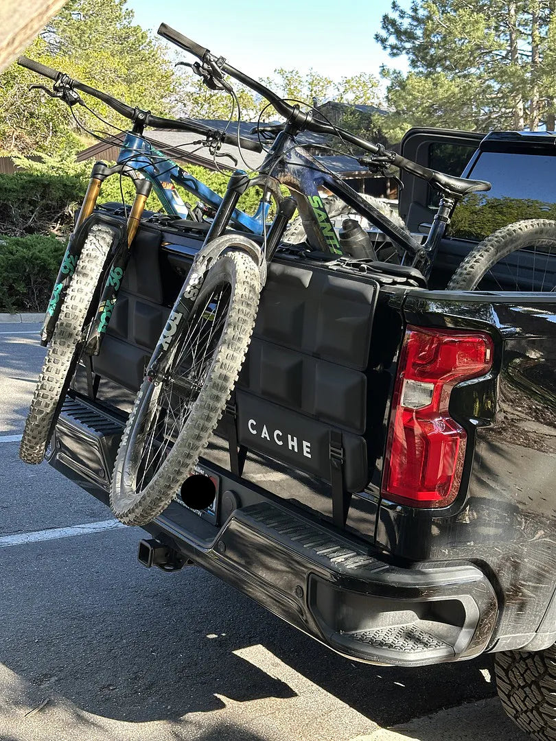 Chevy 1500 with a Cache Tailgate Pad with two bikes on it